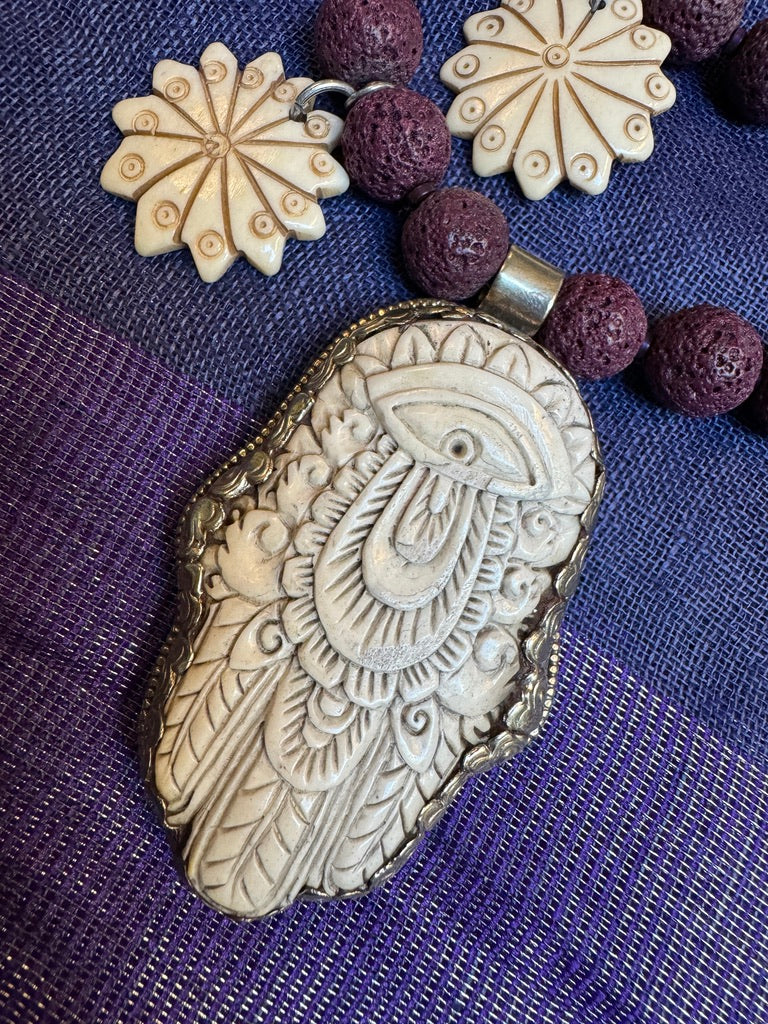 PURPLE LAVA STONE HAMSA NECKLACE