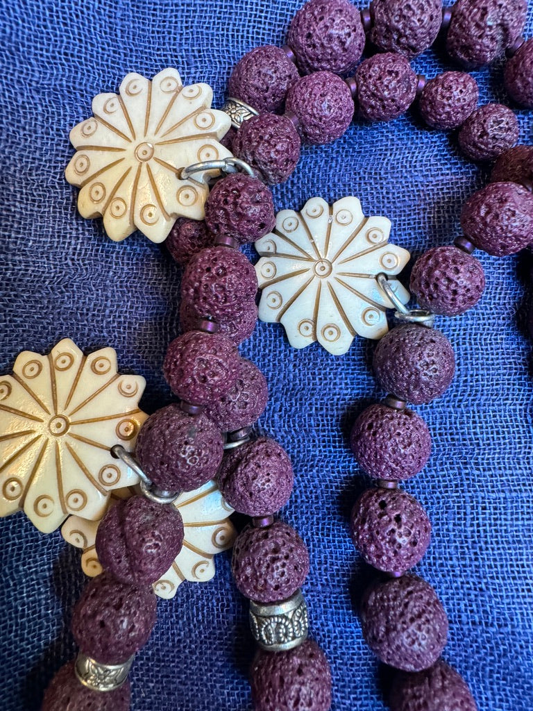 PURPLE LAVA STONE HAMSA NECKLACE