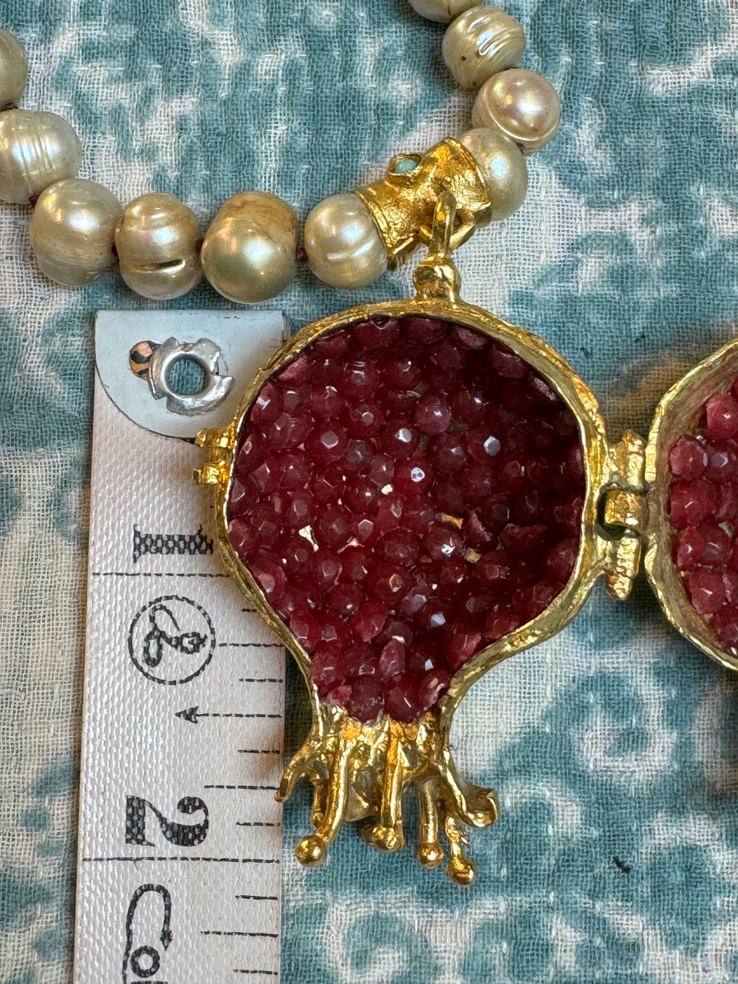A POMEGRANATE & PEARL GARDEN OF NECKLACES, CUFFS, AND EARRINGS