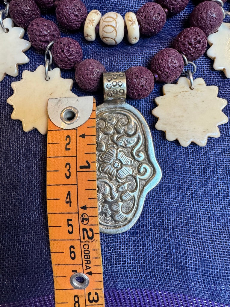 PURPLE LAVA STONE HAMSA NECKLACE