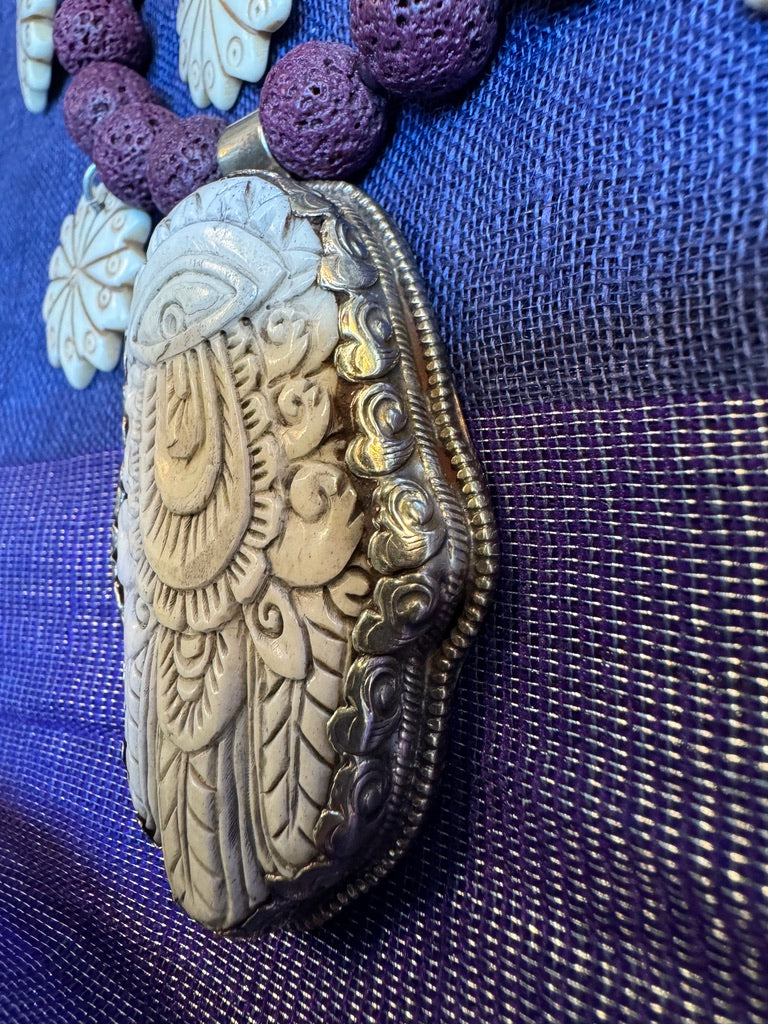 PURPLE LAVA STONE HAMSA NECKLACE