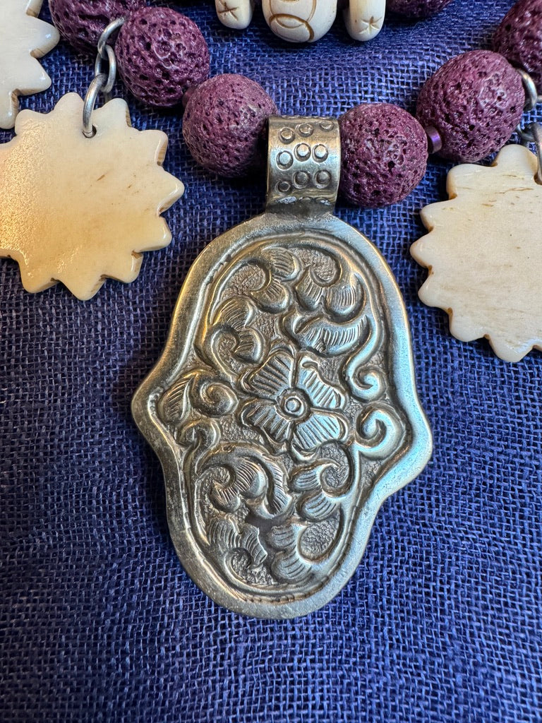 PURPLE LAVA STONE HAMSA NECKLACE