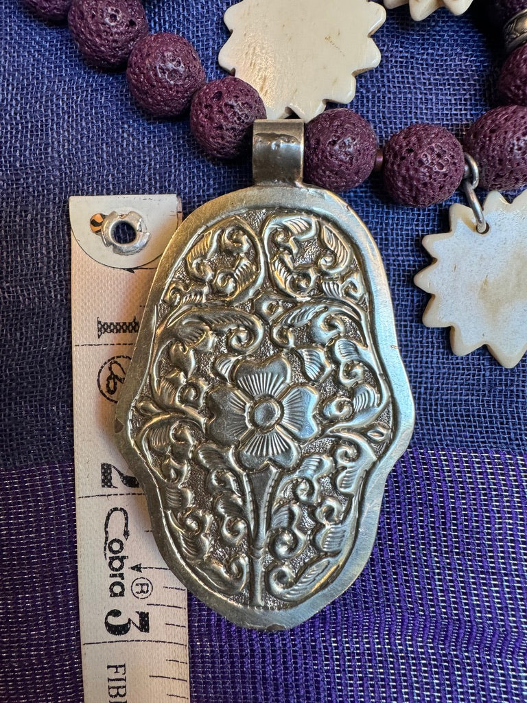 PURPLE LAVA STONE HAMSA NECKLACE