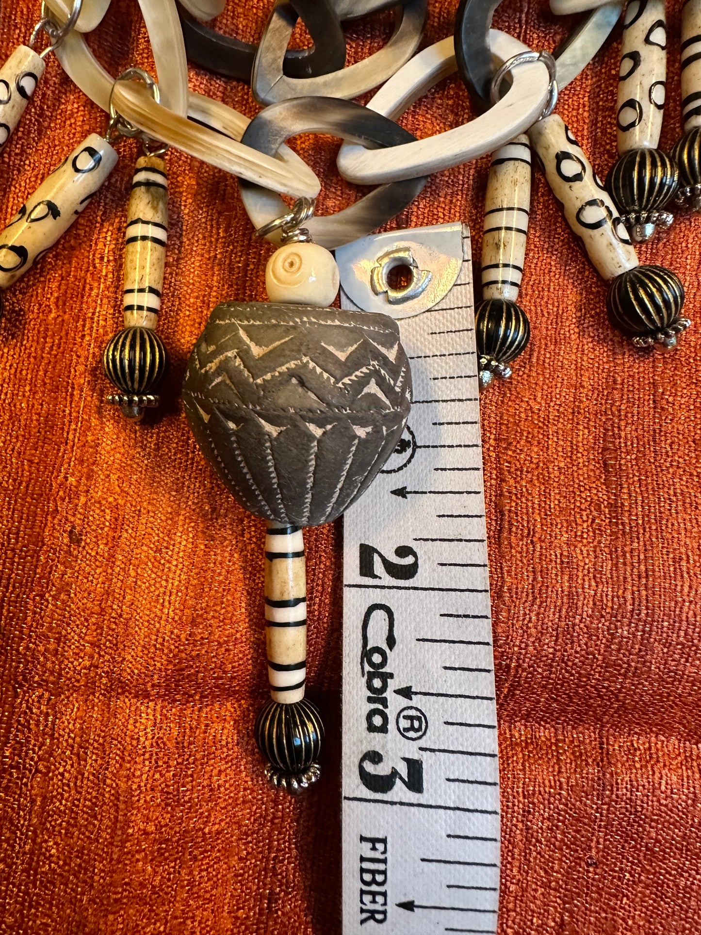 INTERLOCKING HORN NECKLACE