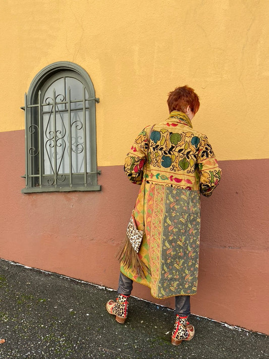 A RANGE OF WARM COLORS SUZANI TAPESTRY COAT