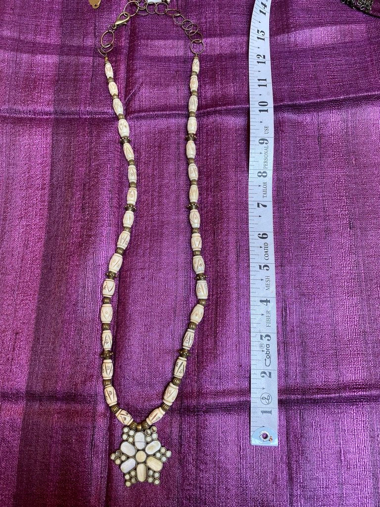 Camel bone mandala brass inlay handcarved bovine and cast brass beads adjustable enclosure Andrea Serrahn Serrahns