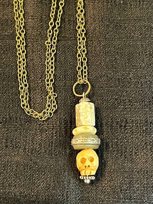 TINY SKULL PENDANT
