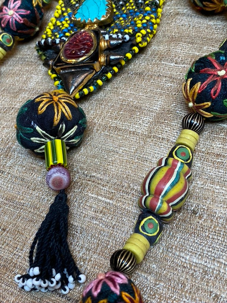 Afghan coin purse hand embroidered cloth bead turquoise carved pink crystal necklace Andrea Serrahn Serrahna