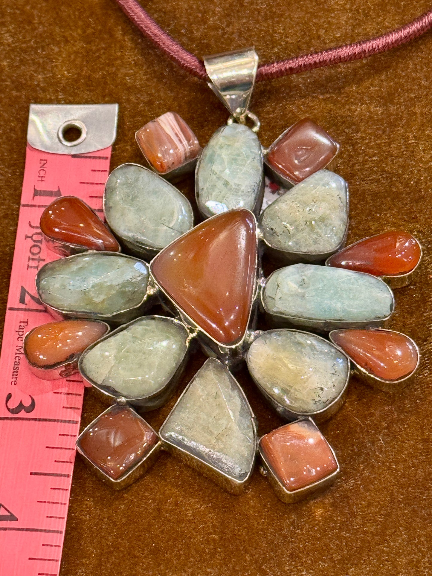 AVENTURINE AND AGATE MAMMOTH PENDANT