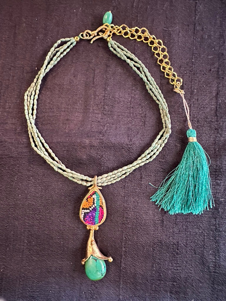 TEXTILES AND TURQUOISE PENDANT