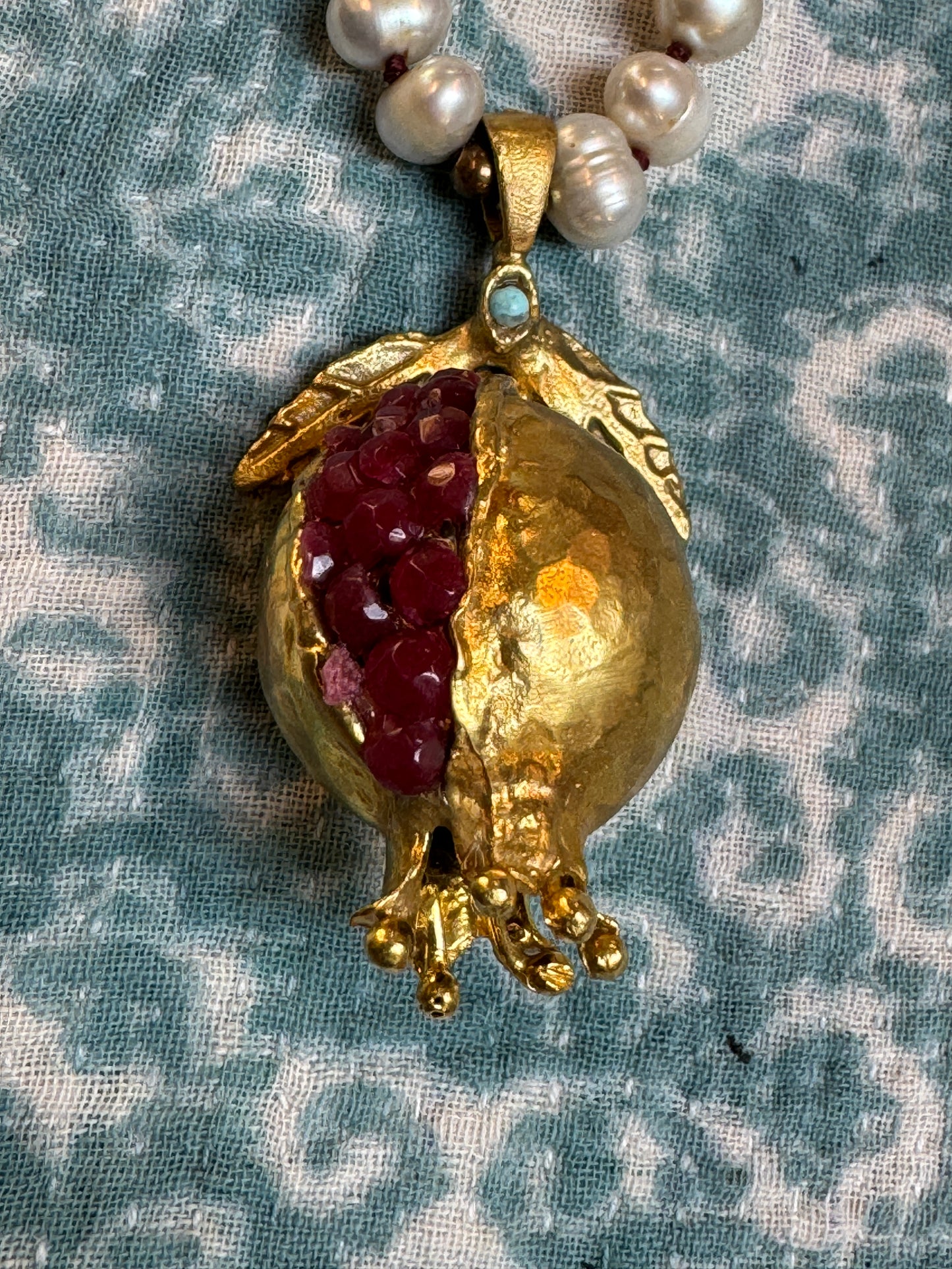 A POMEGRANATE & PEARL GARDEN OF NECKLACES, CUFFS, AND EARRINGS