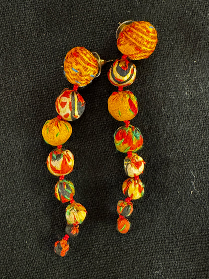 CASCADING CLOTH BALL EARRINGS