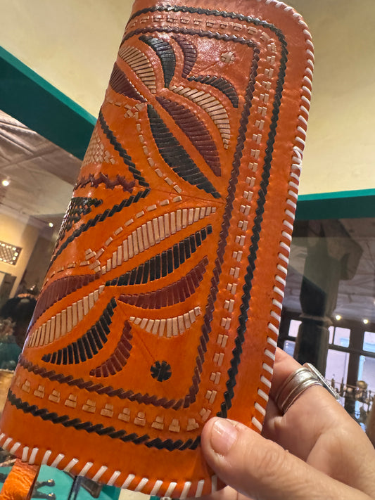 TOOLED TRIBAL CLUTCH