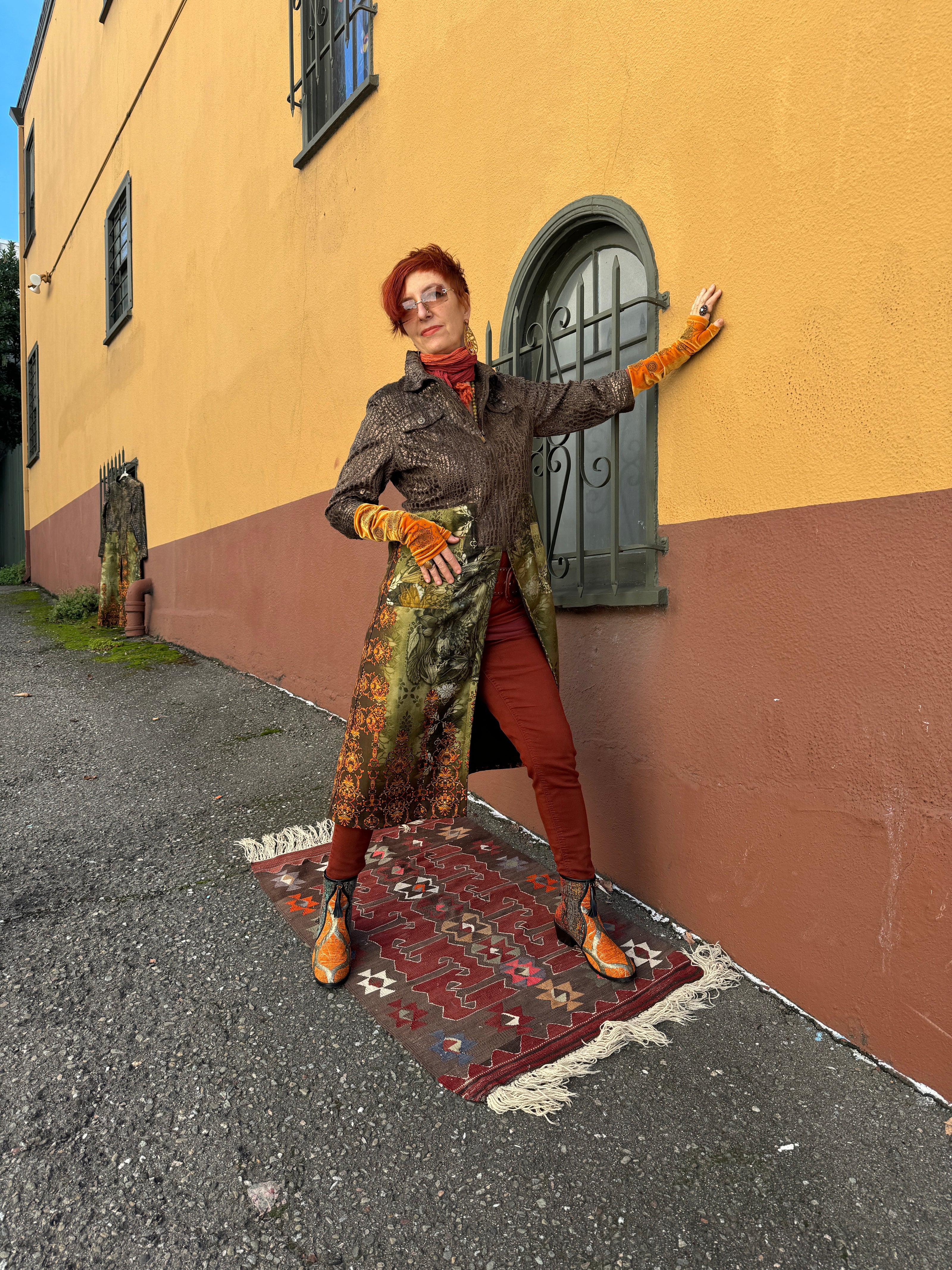 Owner & designer Andrea Serrahn modeling at her fashion boutique in the San Francisco Bay Area specializing in colorful and contemporary clothing for women.