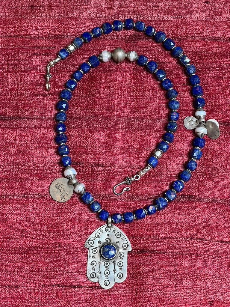 Box cut faceted lapis lazuli tribal hamsa hand-hammered script coin necklace Andrea Serrahn Serrahna