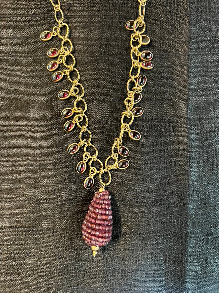 Garnet Pear Shaped pendant with garnet cabochons