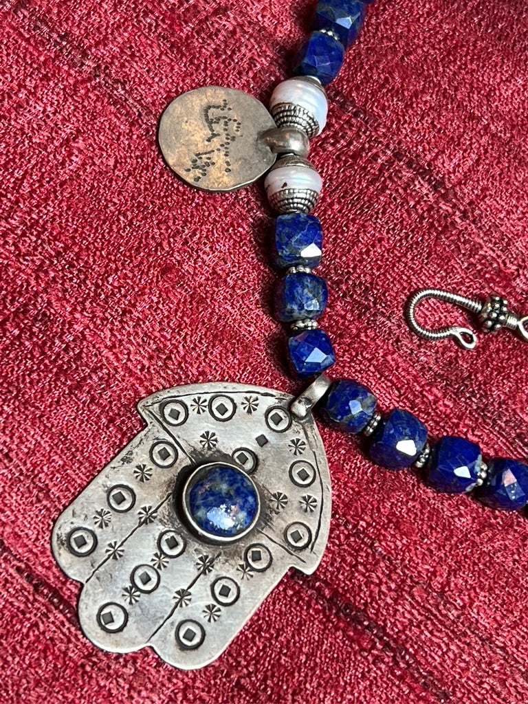 Box cut faceted lapis lazuli tribal hamsa hand-hammered script coin necklace Andrea Serrahn Serrahna