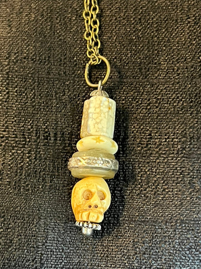 TINY SKULL PENDANT