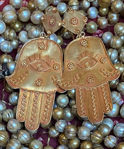 Hamsa earrings, 24kt gold plate, or 88% Kutchi silver.