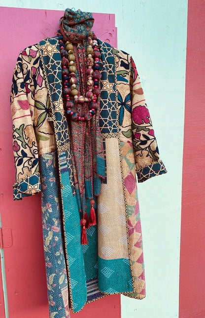 A RANGE OF WARM COLORS SUZANI TAPESTRY COAT