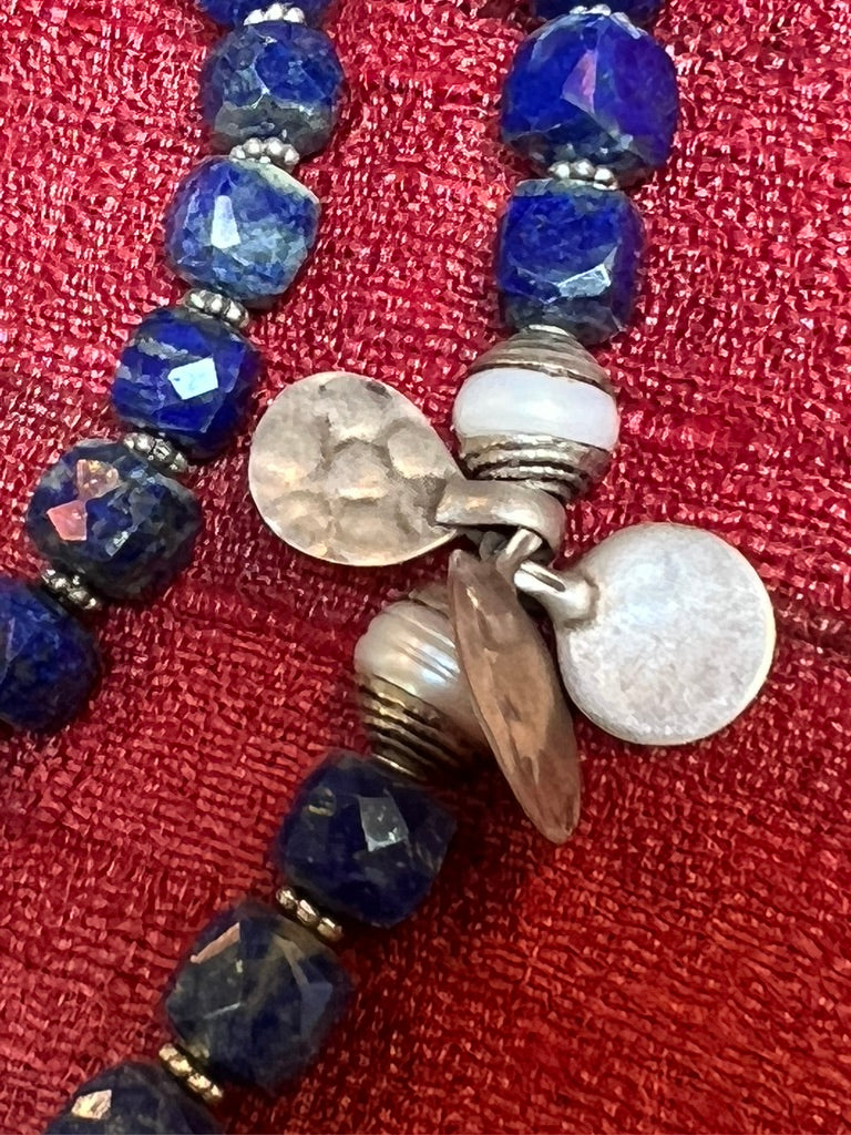 Box cut faceted lapis lazuli tribal hamsa hand-hammered script coin necklace Andrea Serrahn Serrahna