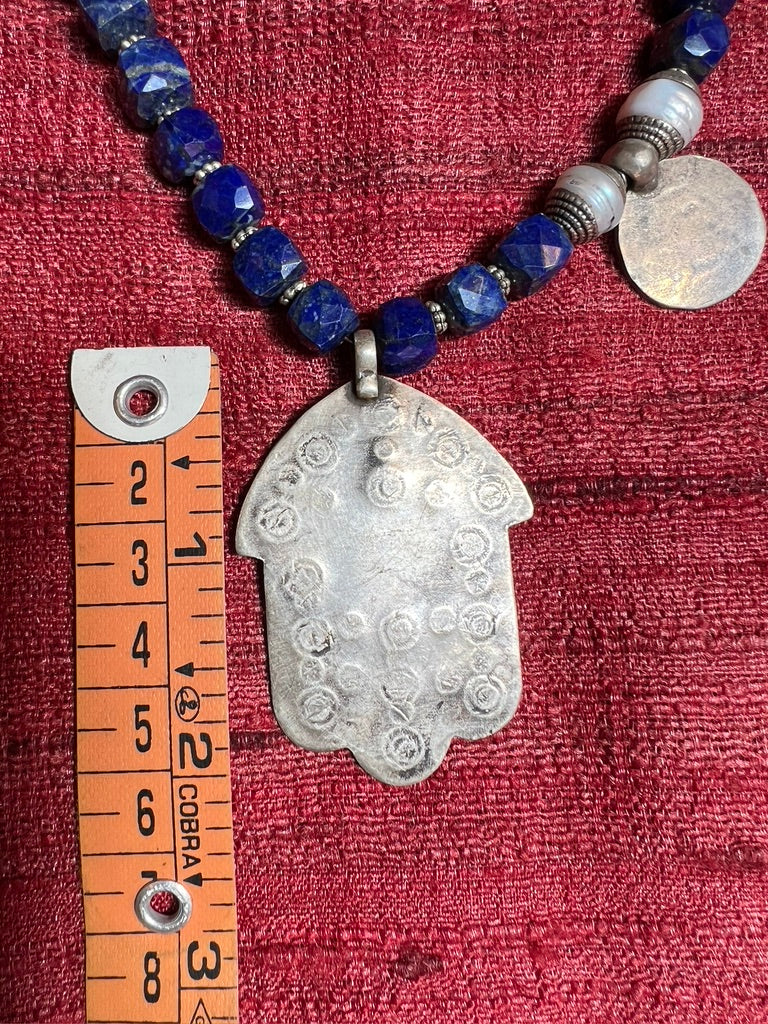 Box cut faceted lapis lazuli tribal hamsa hand-hammered script coin necklace Andrea Serrahn Serrahna