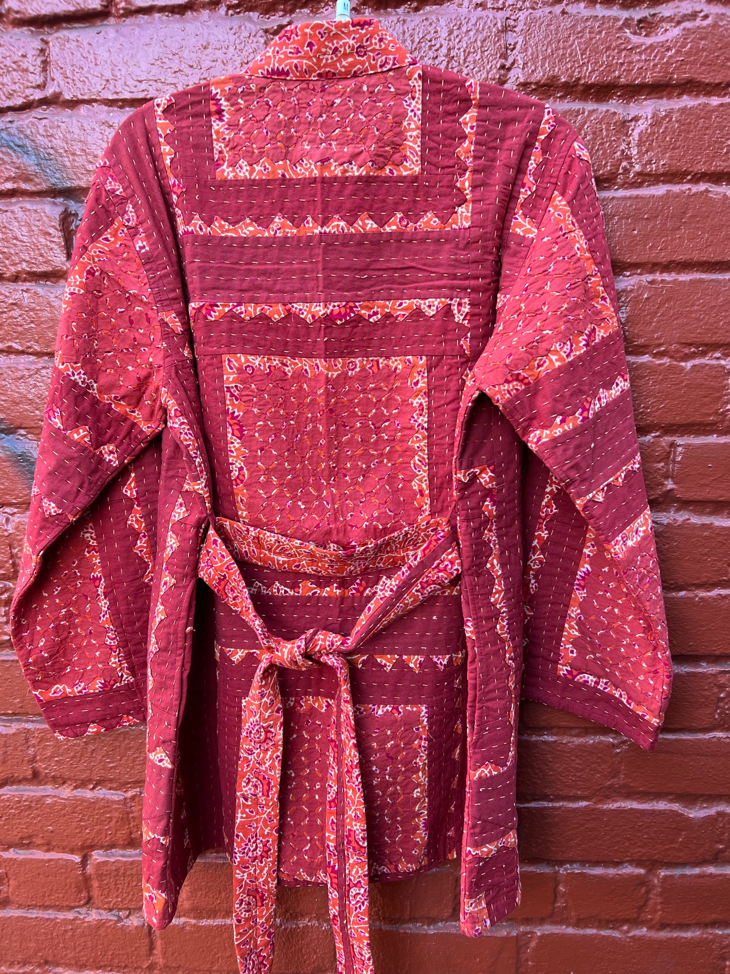 QUILTED RUST WRAP JACKET